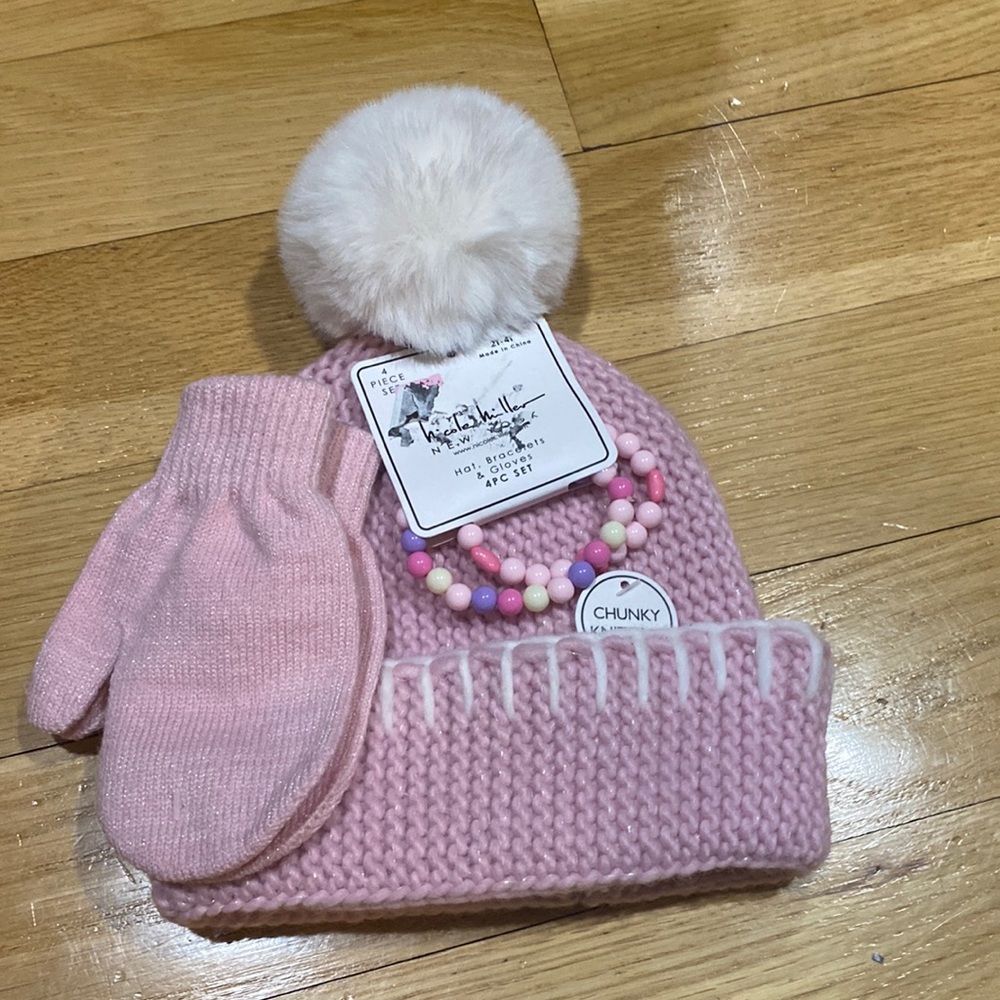 Gorgeous 4 piece set 2-4 years.Hat ,Gloves,2 bracelet s.